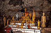 Luang Prabang, Laos - The Pak Ou Caves, the upper cave called Tam Theung. The caves, a Buddhist pilgrimage site, are a repository of old Buddha statues. 